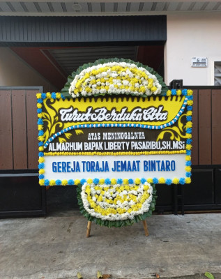 Papan Bunga Duka di Agung